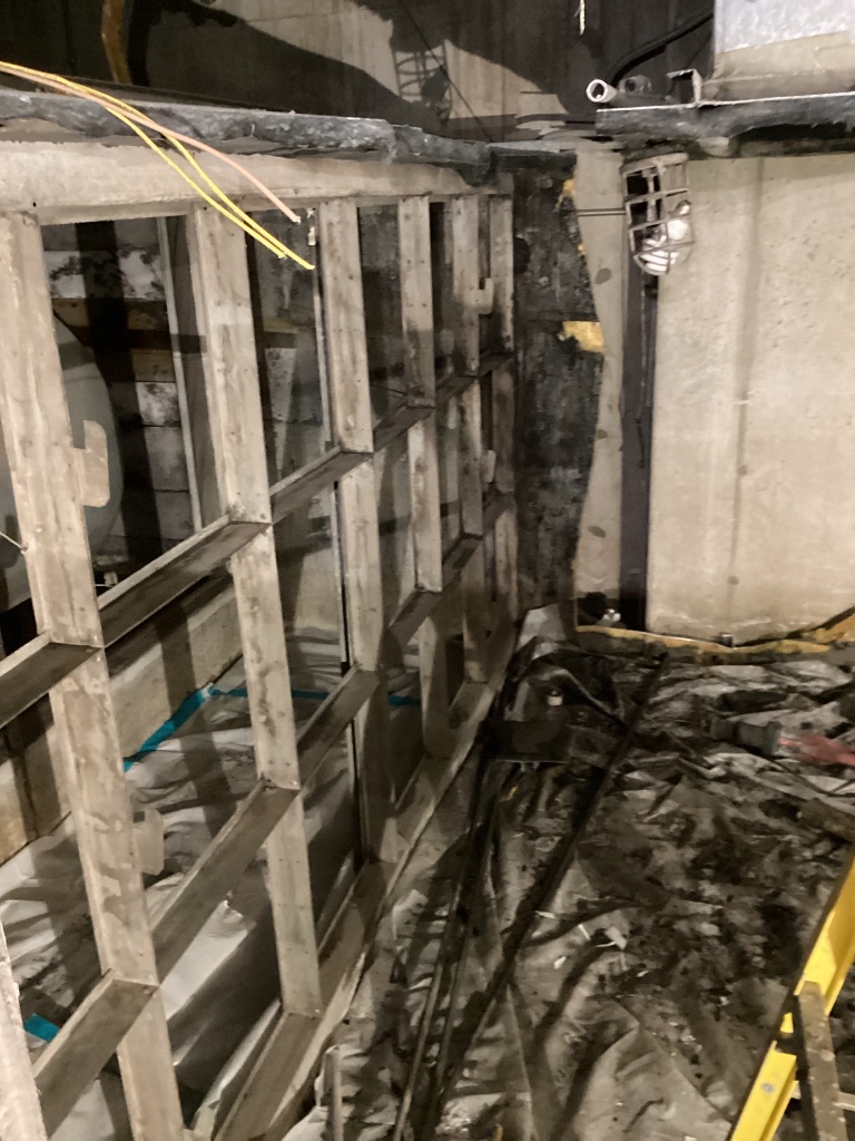 Industrial work area with temporary protection and abatement preparation